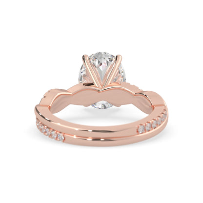 oval brilliant lab grown diamond engagement ring with prong setting and twisted pavé diamond band in rose gold tone