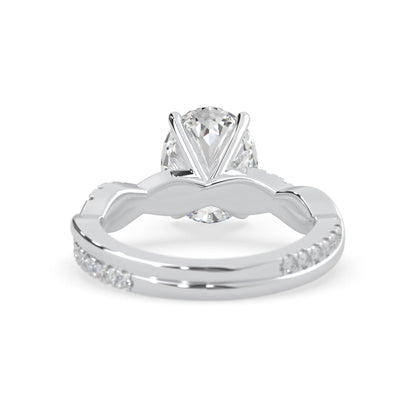 oval brilliant lab grown diamond engagement ring with prong setting and twisted pavé diamond band in white gold tone