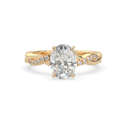 oval brilliant lab grown diamond engagement ring with prong setting and twisted pavé diamond band in yellow gold tone