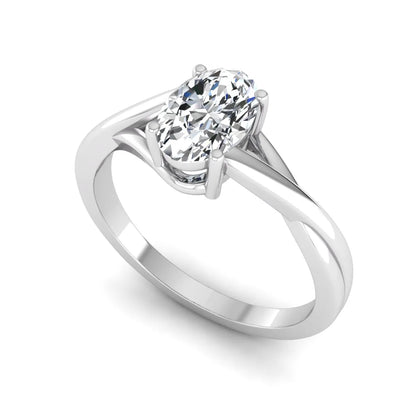 Oval twisted shank solitaire lab grown diamond engagement ring featuring a 1.50 carat IGI certified oval cut diamond in a white gold setting.