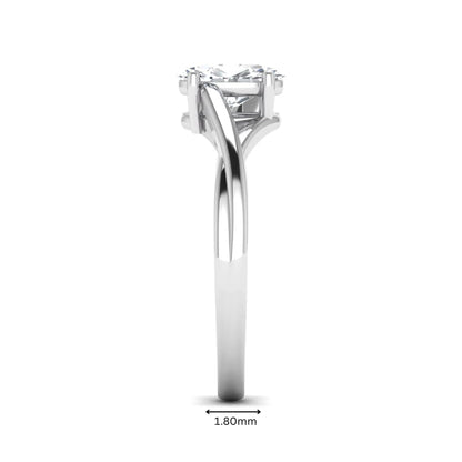 Oval twisted shank solitaire lab grown diamond engagement ring featuring a 1.50 carat IGI certified oval cut diamond in a white gold setting.