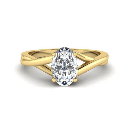 Oval twisted shank solitaire lab grown diamond engagement ring featuring a 1.50 carat IGI certified oval cut diamond in a yellow gold setting.