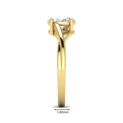 Oval twisted shank solitaire lab grown diamond engagement ring featuring a 1.50 carat IGI certified oval cut diamond in a yellow gold setting.