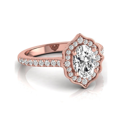 Oval cut lab grown diamond engagement ring featuring a vintage-inspired scalloped halo, pavé diamond band, and rose gold tone setting.