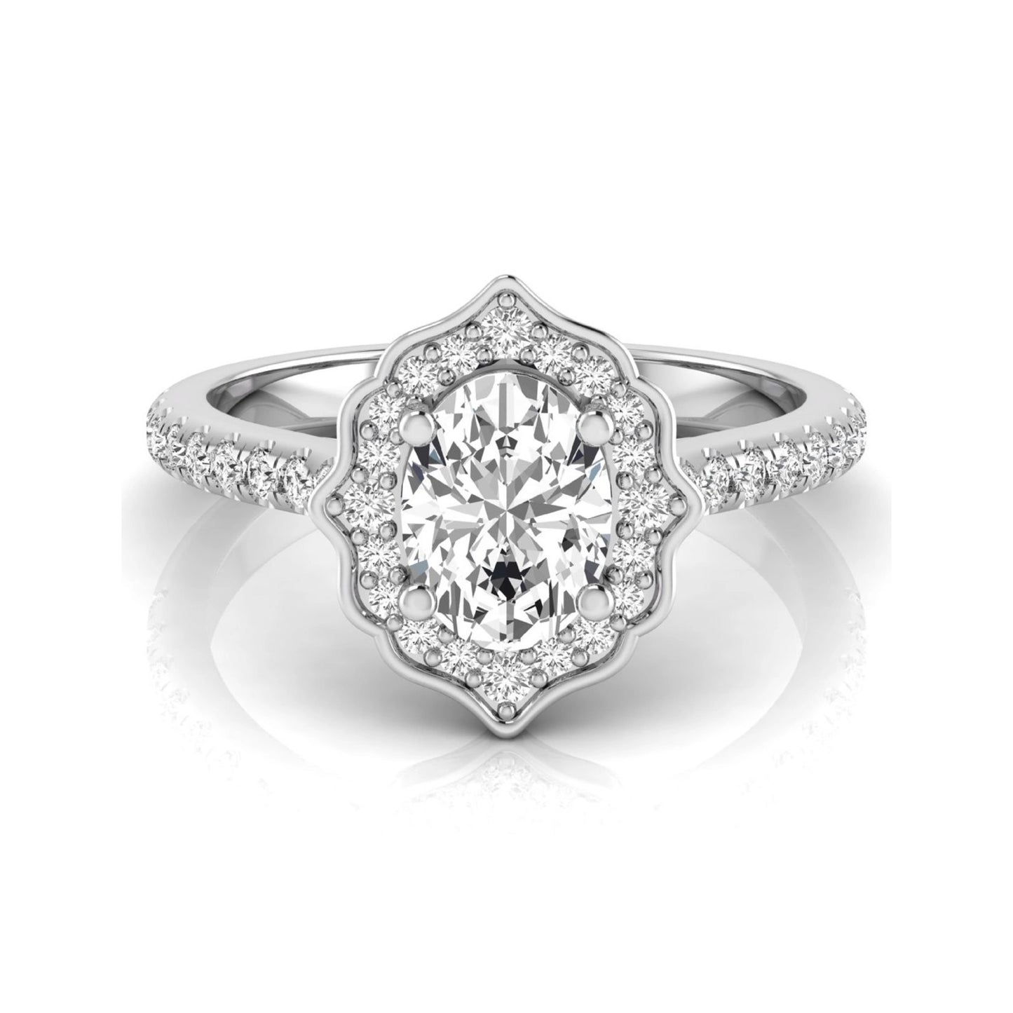 Oval cut lab grown diamond engagement ring featuring a vintage-inspired scalloped halo, pavé diamond band, and white gold tone setting.