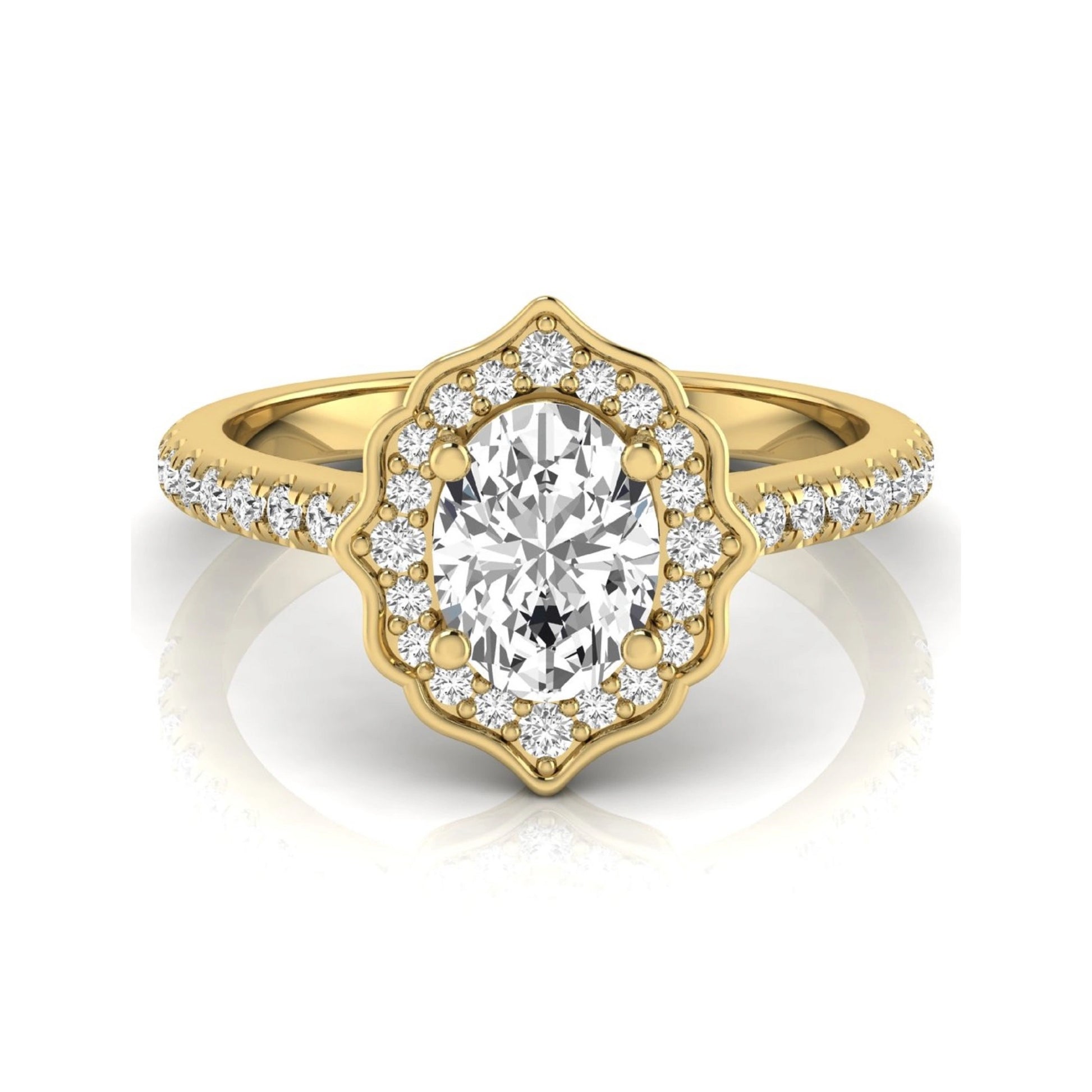 Oval cut lab grown diamond engagement ring featuring a vintage-inspired scalloped halo, pavé diamond band, and yellow gold tone setting.