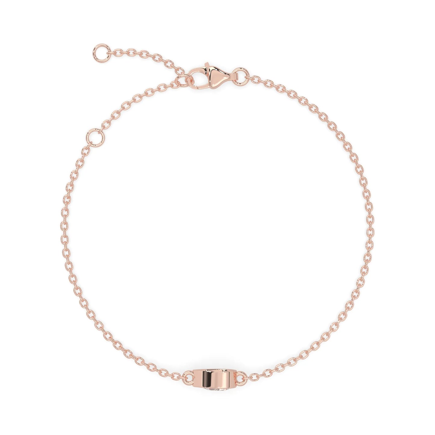 Pear cut lab grown diamond bezel set solitaire bracelet with delicate chain and lobster clasp in rose gold tone.