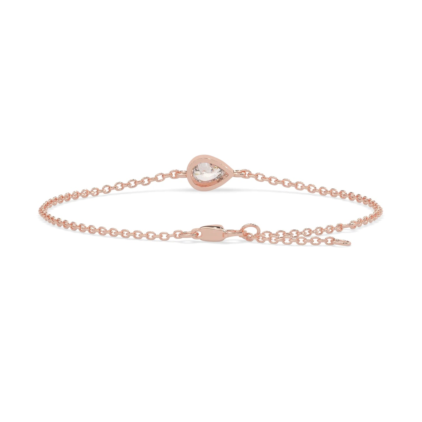Pear cut lab grown diamond bezel set solitaire bracelet with delicate chain and lobster clasp in rose gold tone.