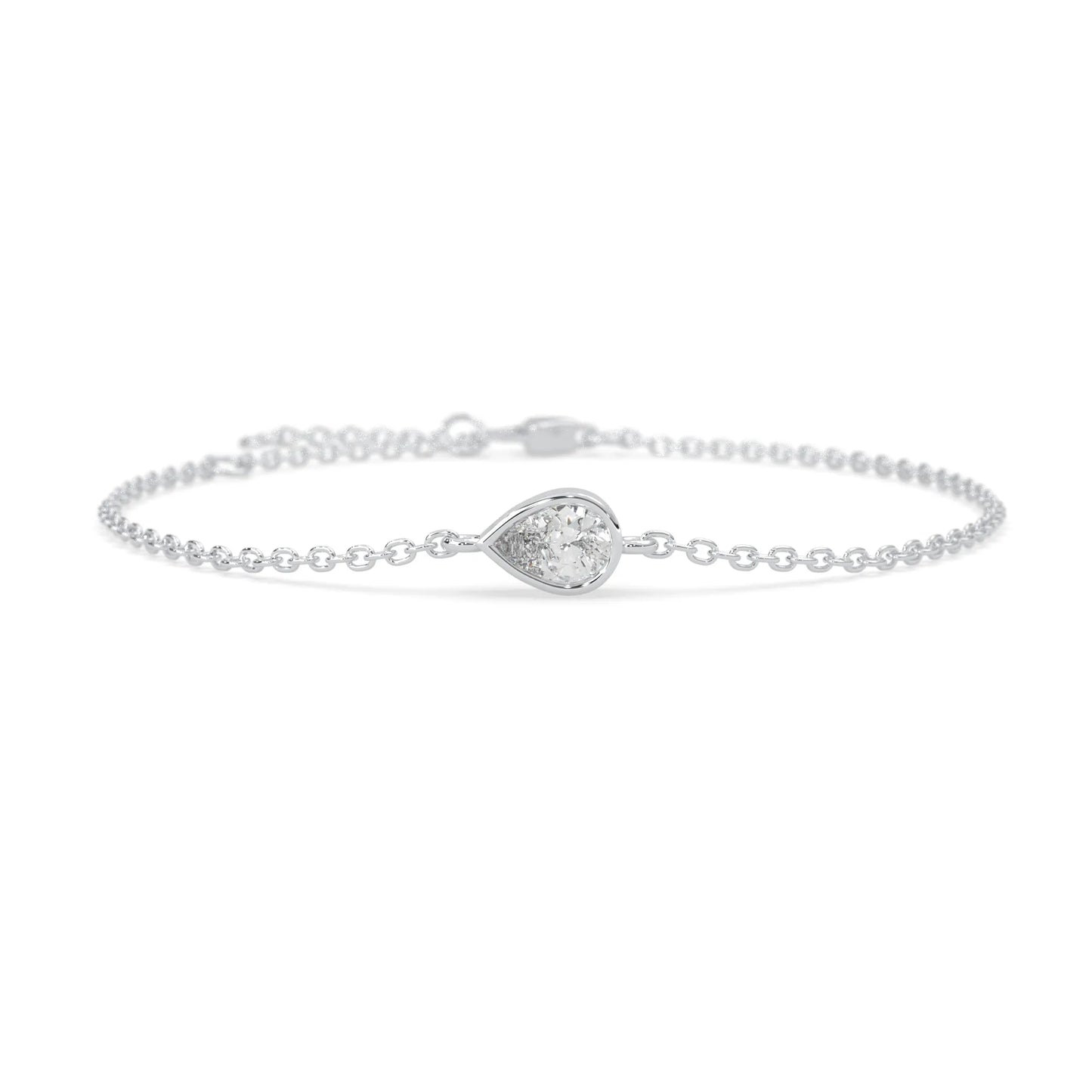 Pear cut lab grown diamond bezel set solitaire bracelet with delicate chain and lobster clasp in white gold tone.
