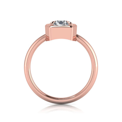 Pear cut lab grown diamond solitaire engagement ring featuring a 1.75 carat pear diamond in a modern partial bezel prong setting in rose gold