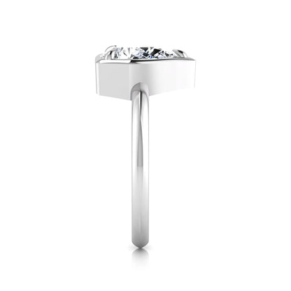 Pear cut lab grown diamond solitaire engagement ring featuring a 1.75 carat pear diamond in a modern partial bezel prong setting in white gold