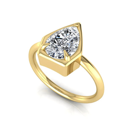 Pear cut lab grown diamond solitaire engagement ring featuring a 1.75 carat pear diamond in a modern partial bezel prong setting in yellow gold