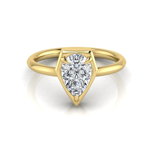 Pear cut lab grown diamond solitaire engagement ring featuring a 1.75 carat pear diamond in a modern partial bezel prong setting in yellow gold