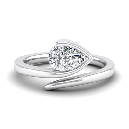 Pear cut lab grown diamond bypass engagement ring featuring a 1.00 carat IGI certified diamond in a modern partial bezel setting with a white gold design.