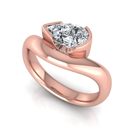 Pear cut lab grown diamond bezel set solitaire engagement ring in rose gold tone