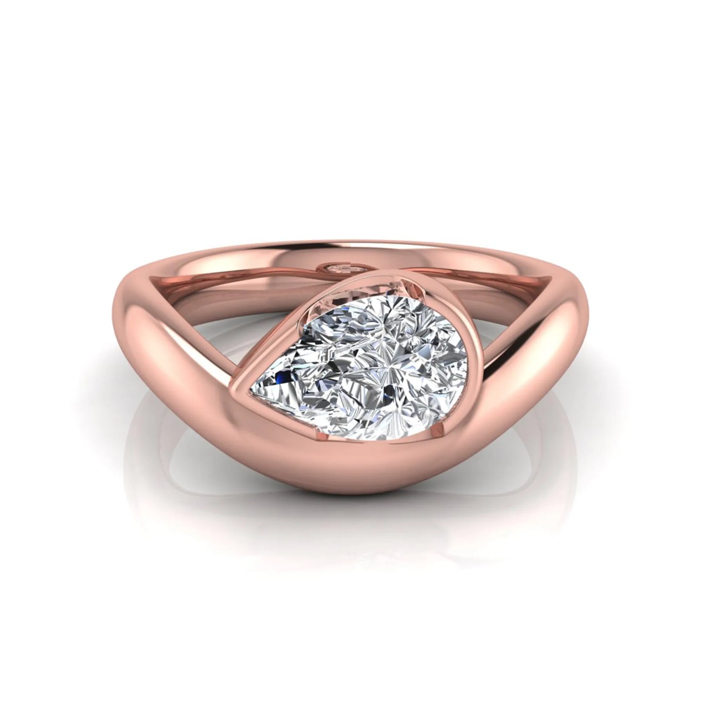 Pear cut lab grown diamond bezel set solitaire engagement ring in rose gold tone