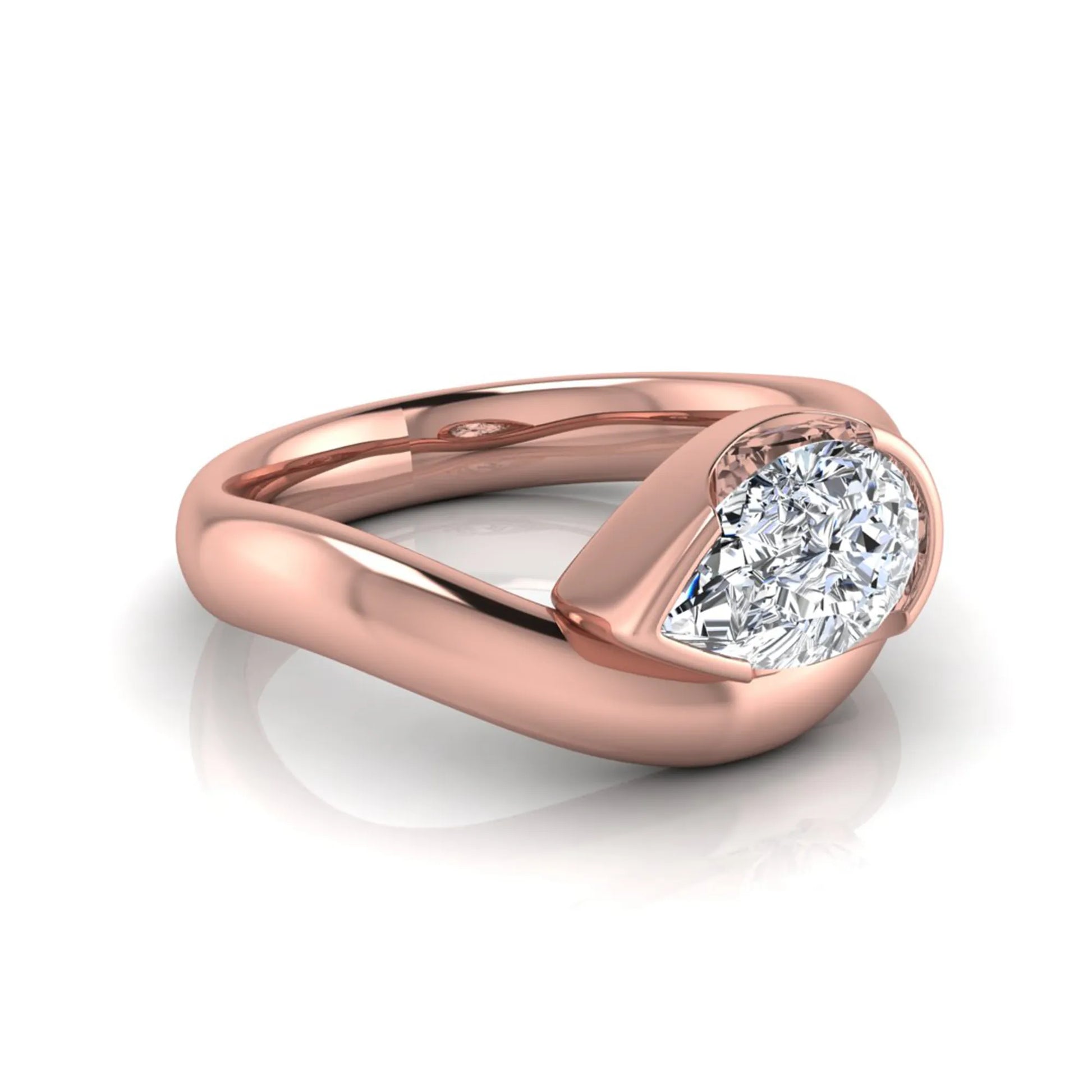 Pear cut lab grown diamond bezel set solitaire engagement ring in rose gold tone