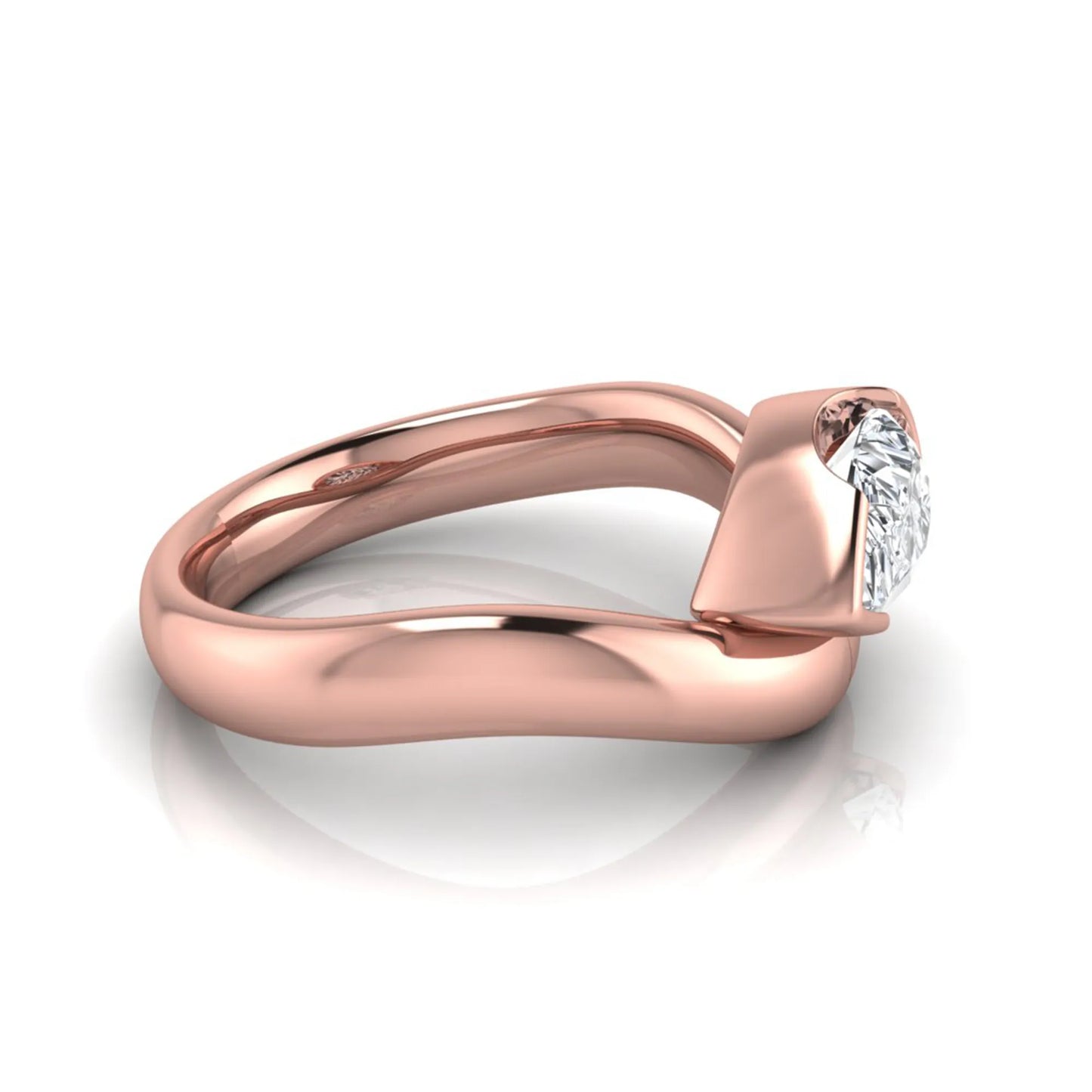 Pear cut lab grown diamond bezel set solitaire engagement ring in rose gold tone