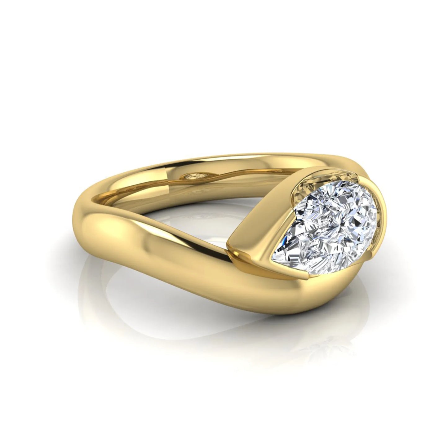 Pear cut lab grown diamond bezel set solitaire engagement ring in yellow gold tone