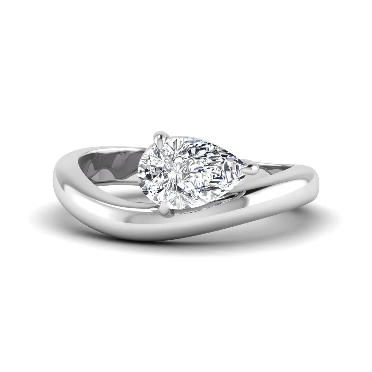 Pear cut lab grown diamond curved solitaire engagement ring with a four-prong setting in white gold