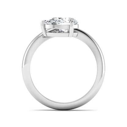 Pear cut lab grown diamond curved solitaire engagement ring with a four-prong setting in white gold