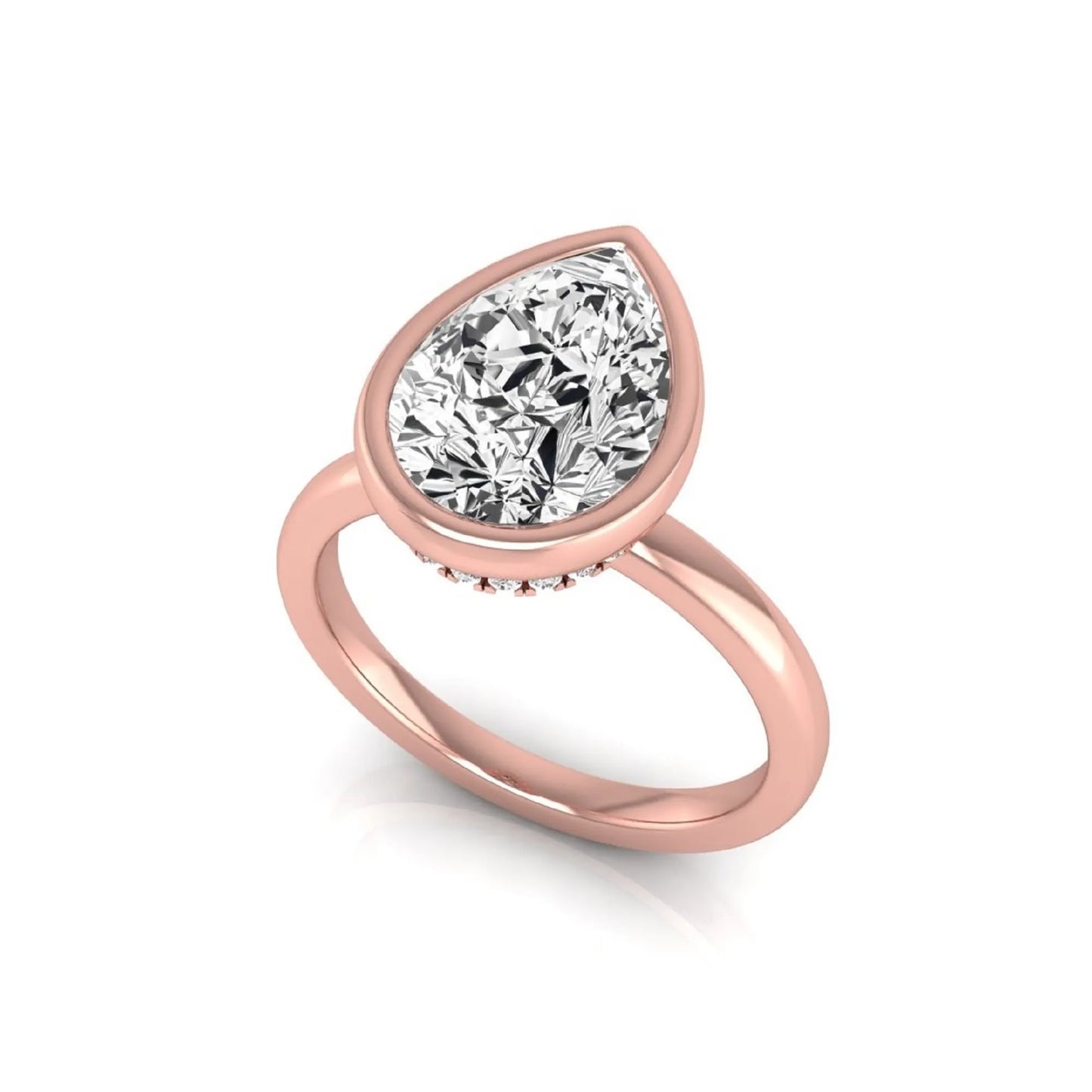 Pear cut lab grown diamond engagement ring featuring a 1.80 carat IGI certified diamond in a bezel setting with a hidden halo of round diamonds on a rose gold band.