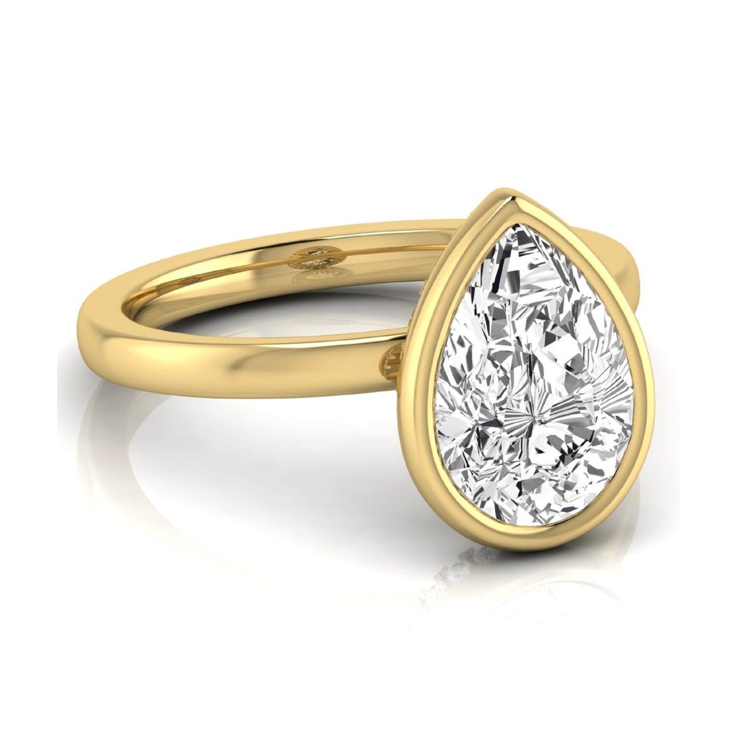 Pear cut lab grown diamond engagement ring featuring a 1.80 carat IGI certified diamond in a bezel setting with a hidden halo of round diamonds on a yellow gold band.