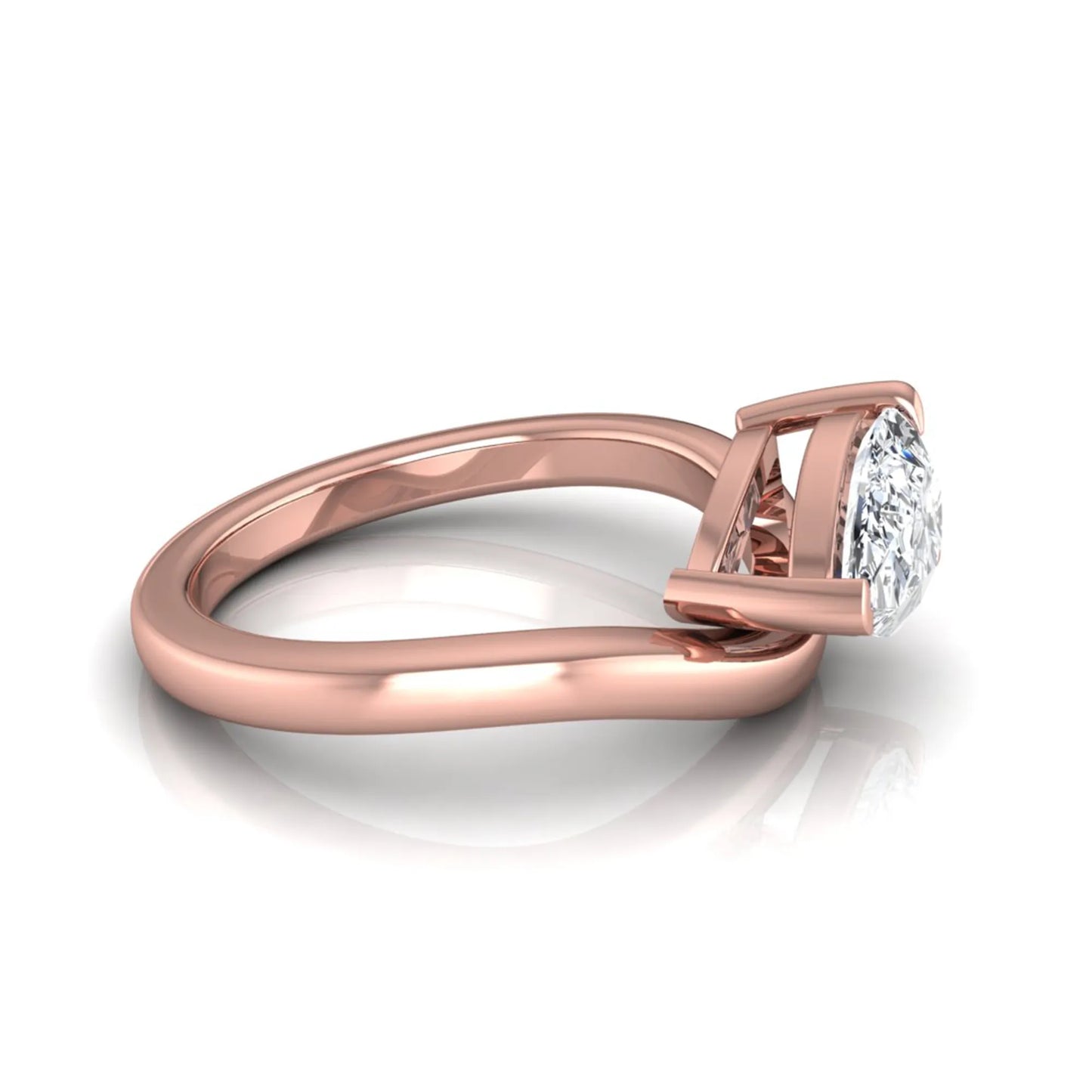 Pear cut lab grown diamond curved solitaire engagement ring in rose gold with a sculpted curved band and IGI certified center diamond.