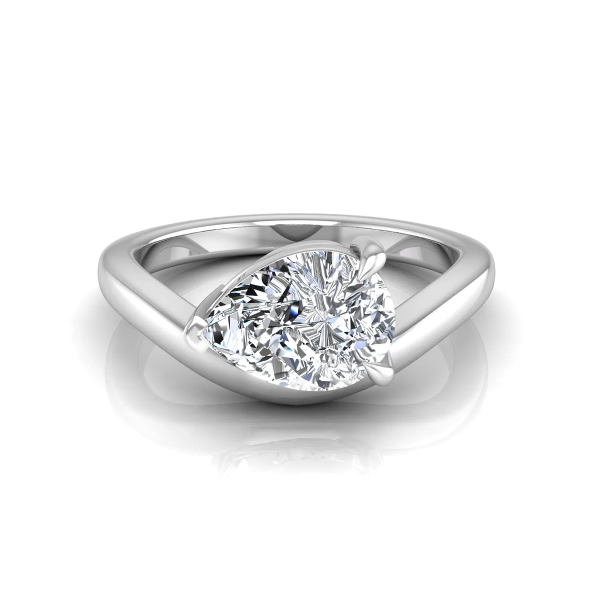 Pear cut lab grown diamond curved solitaire engagement ring in white gold with a sculpted curved band and IGI certified center diamond.