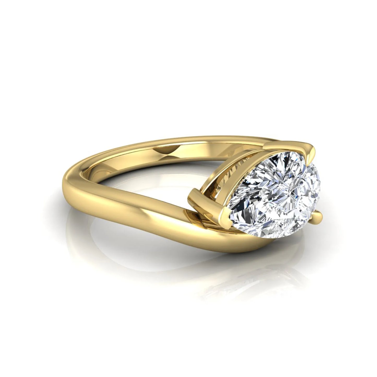 Pear cut lab grown diamond curved solitaire engagement ring in yellow gold with a sculpted curved band and IGI certified center diamond.