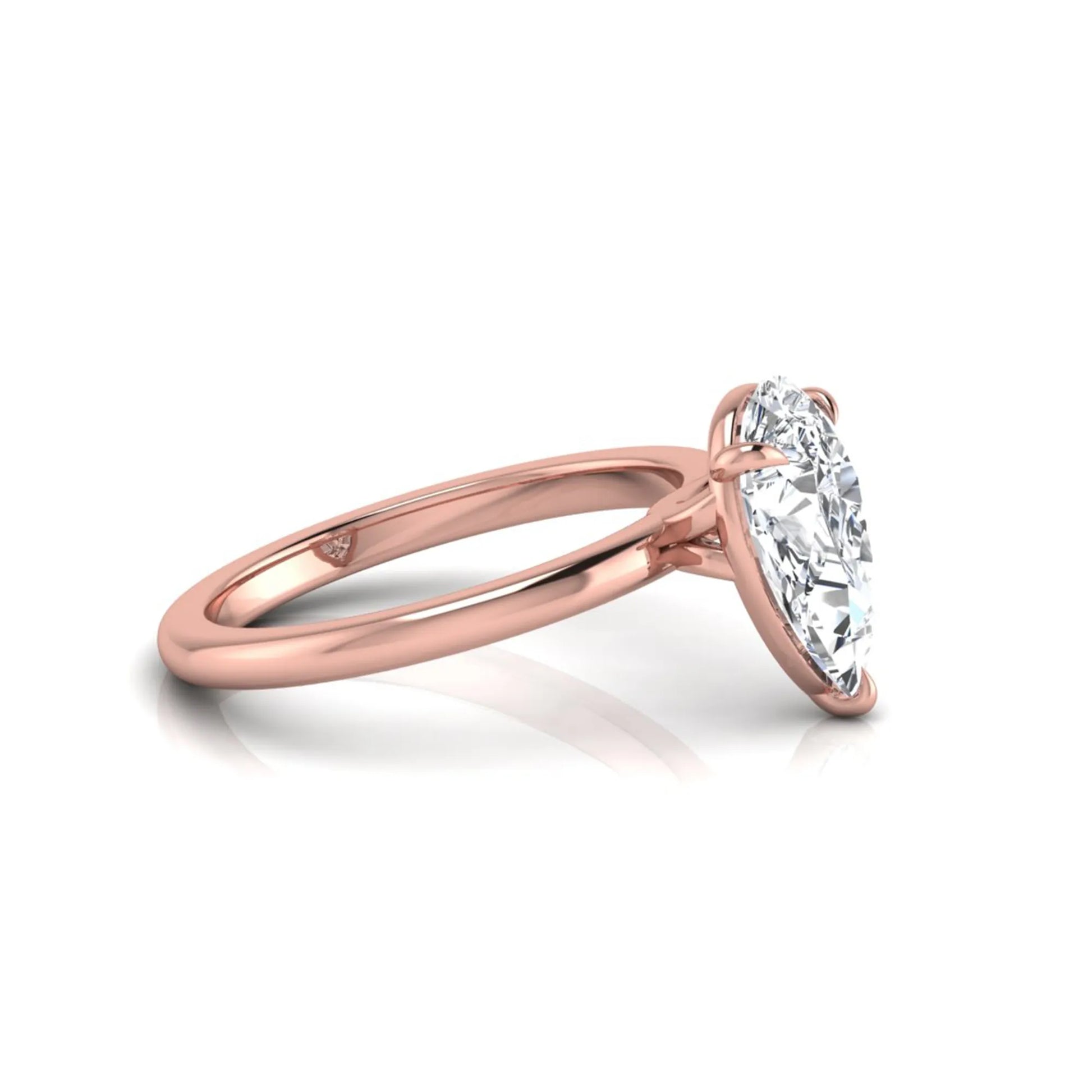 rose gold 3 carat pear cut lab grown diamond solitaire engagement ring featuring an IGI certified center diamond in a classic three-prong setting.