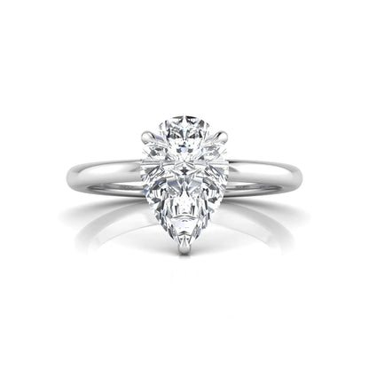 white gold 3 carat pear cut lab grown diamond solitaire engagement ring featuring an IGI certified center diamond in a classic three-prong setting.