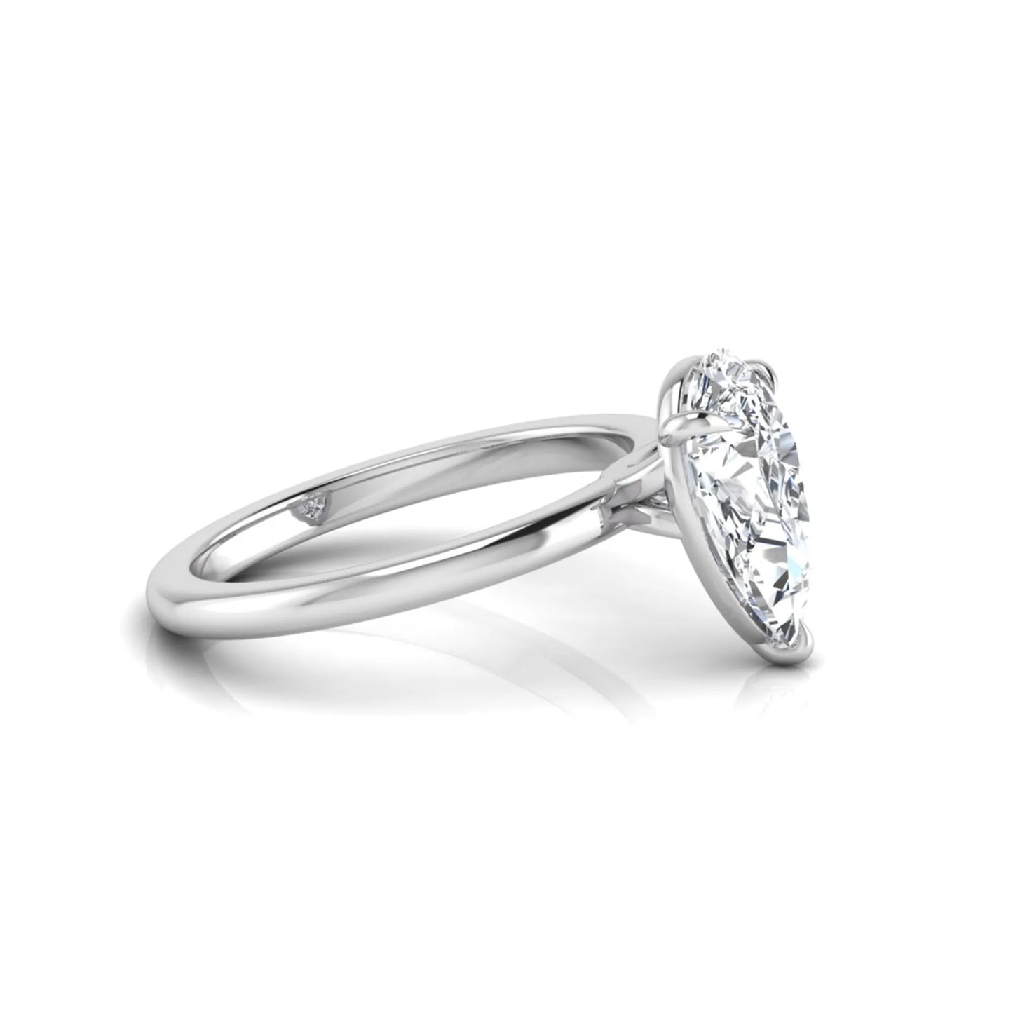 white gold 3 carat pear cut lab grown diamond solitaire engagement ring featuring an IGI certified center diamond in a classic three-prong setting.