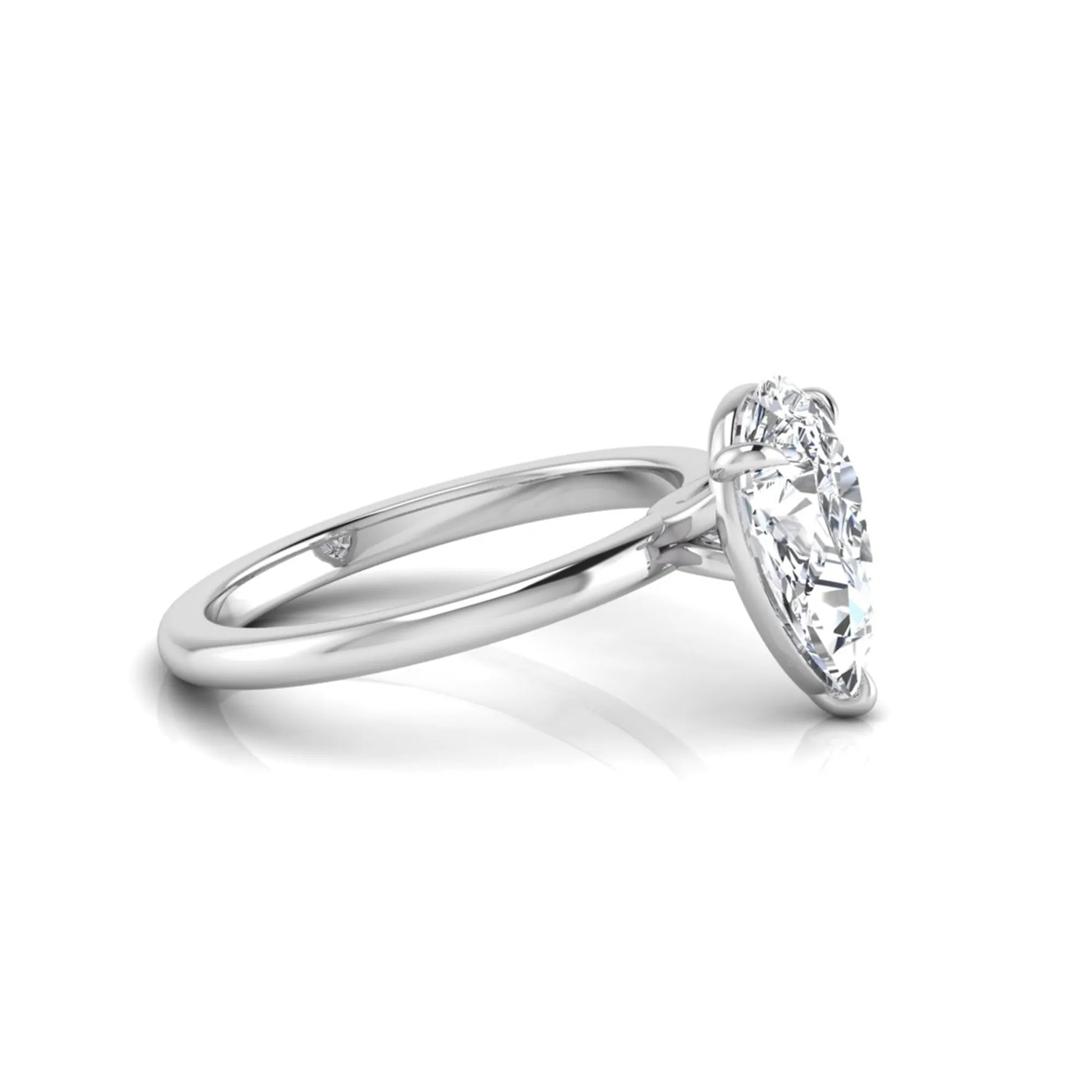 white gold 3 carat pear cut lab grown diamond solitaire engagement ring featuring an IGI certified center diamond in a classic three-prong setting.