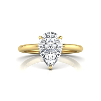 yellow gold 3 carat pear cut lab grown diamond solitaire engagement ring featuring an IGI certified center diamond in a classic three-prong setting.