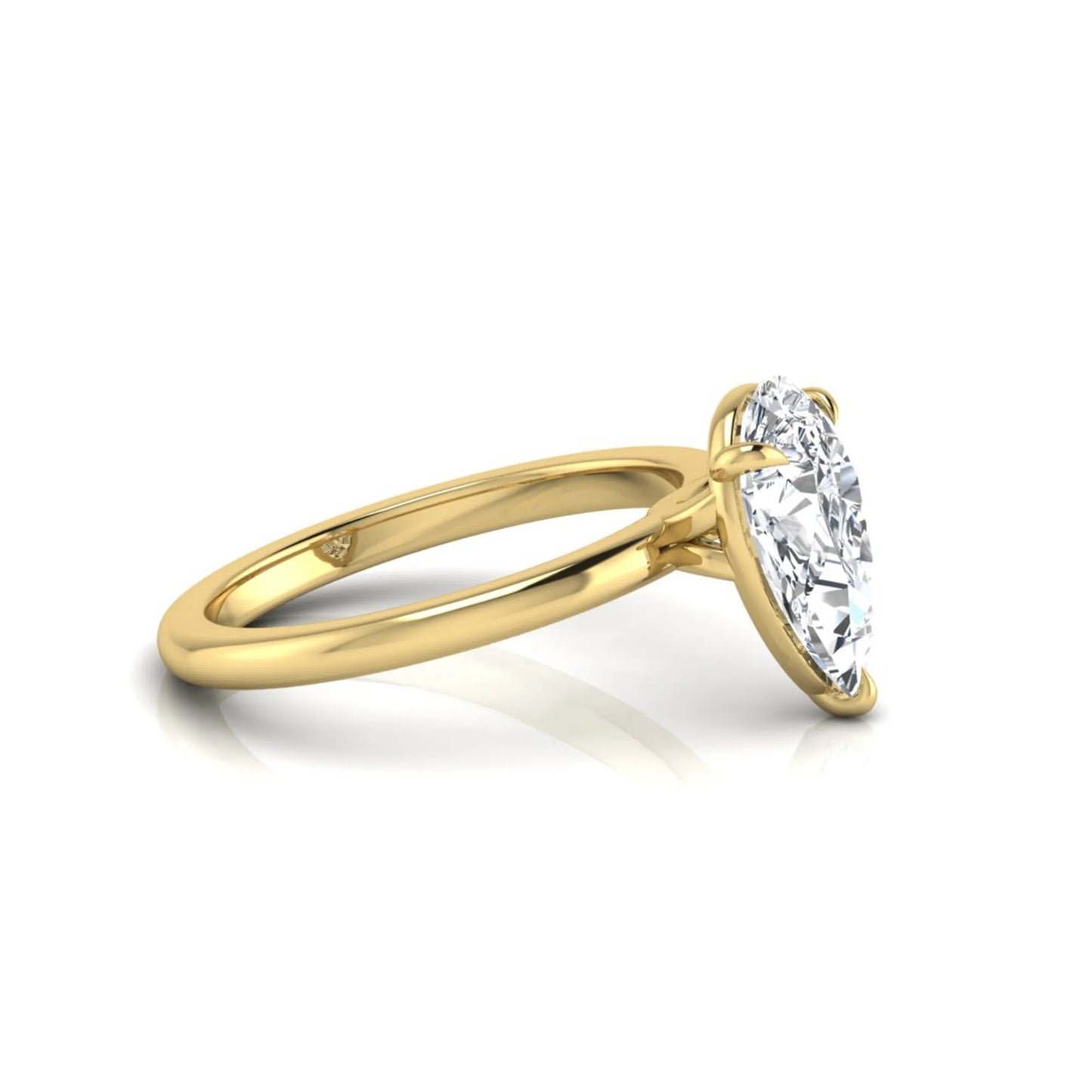 yellow gold 3 carat pear cut lab grown diamond solitaire engagement ring featuring an IGI certified center diamond in a classic three-prong setting.