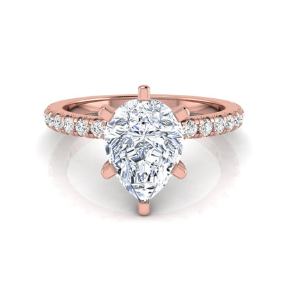 Pear cut lab grown diamond solitaire engagement ring with pavé side diamonds in rose gold featuring a 1.75 carat IGI certified center diamond.
