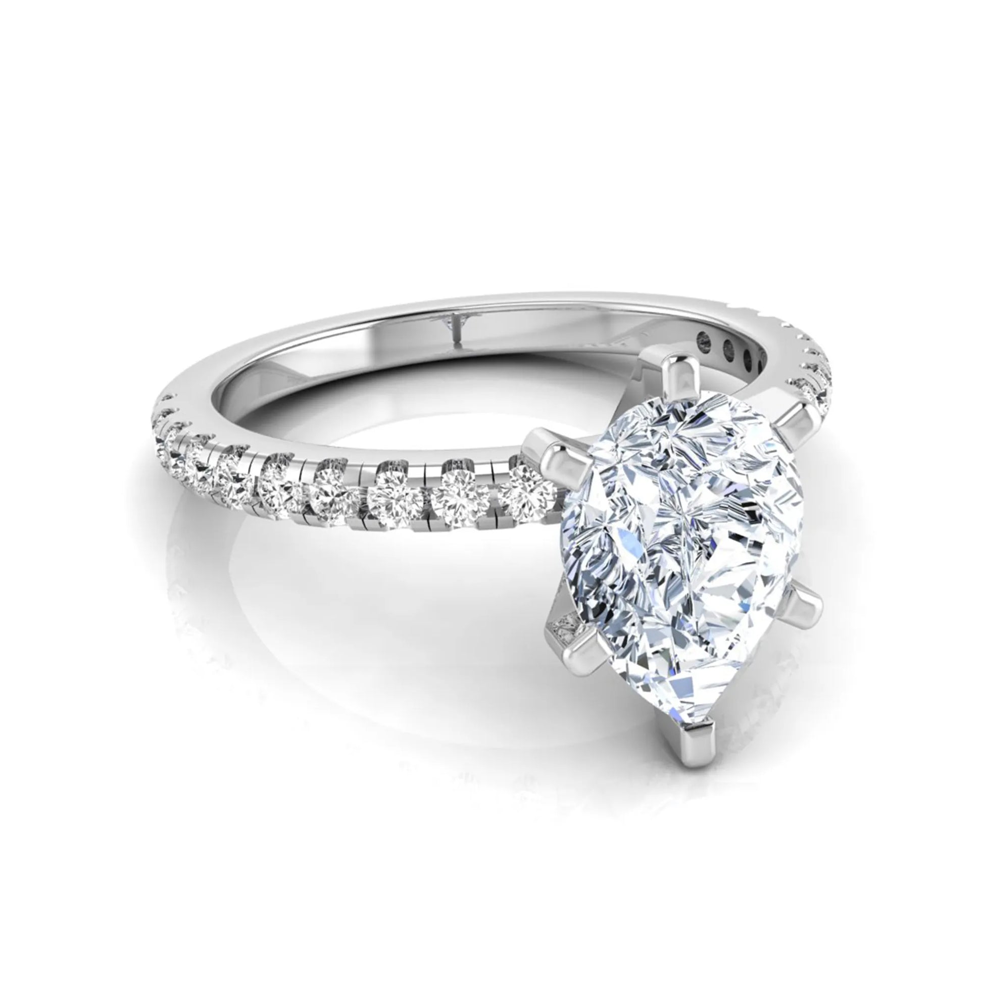 Pear cut lab grown diamond solitaire engagement ring with pavé side diamonds in white gold featuring a 1.75 carat IGI certified center diamond.