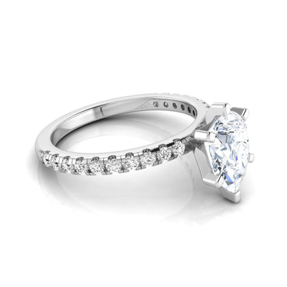 Pear cut lab grown diamond solitaire engagement ring with pavé side diamonds in white gold featuring a 1.75 carat IGI certified center diamond.