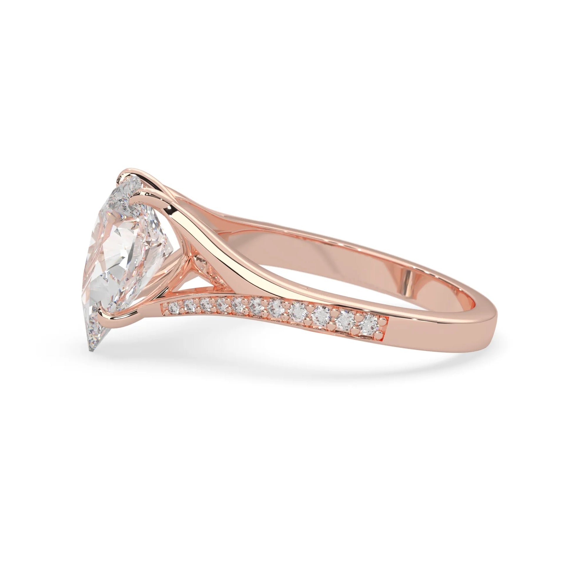 Pear cut lab grown diamond split shank engagement ring with diamond accented band in rose gold