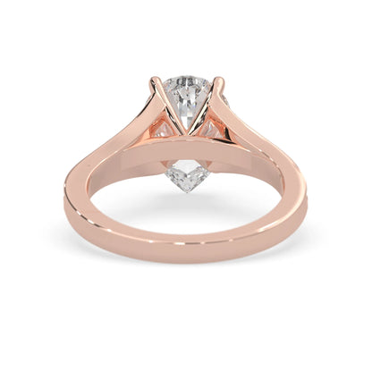 Pear cut lab grown diamond split shank engagement ring with diamond accented band in rose gold