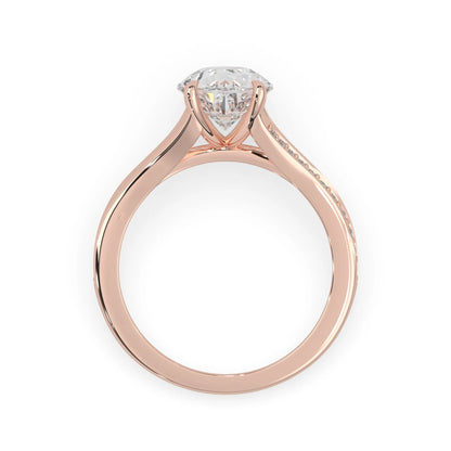 Pear cut lab grown diamond split shank engagement ring with diamond accented band in rose gold
