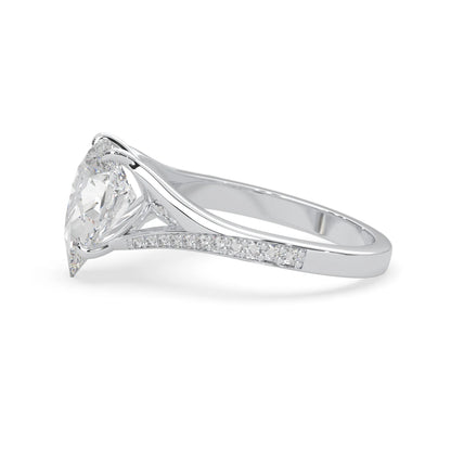 Pear cut lab grown diamond split shank engagement ring with diamond accented band in white gold