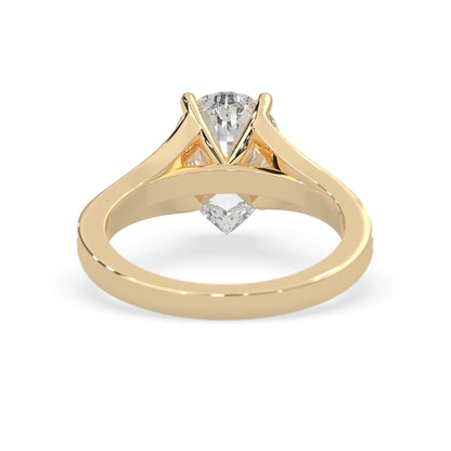 Pear cut lab grown diamond split shank engagement ring with diamond accented band in yellow gold