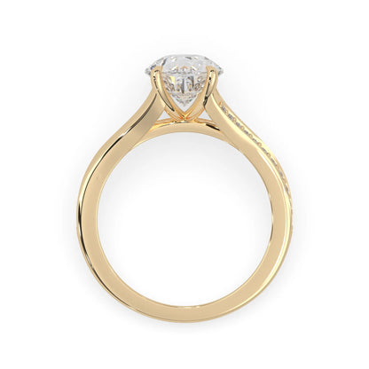 Pear cut lab grown diamond split shank engagement ring with diamond accented band in yellow gold