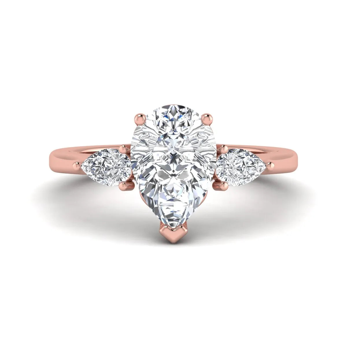 IGI certified pear cut lab grown diamond three stone engagement ring with pear side diamonds in rose gold.