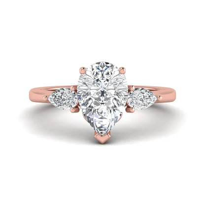 IGI certified pear cut lab grown diamond three stone engagement ring with pear side diamonds in rose gold.