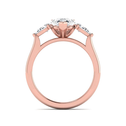 IGI certified pear cut lab grown diamond three stone engagement ring with pear side diamonds in rose gold.