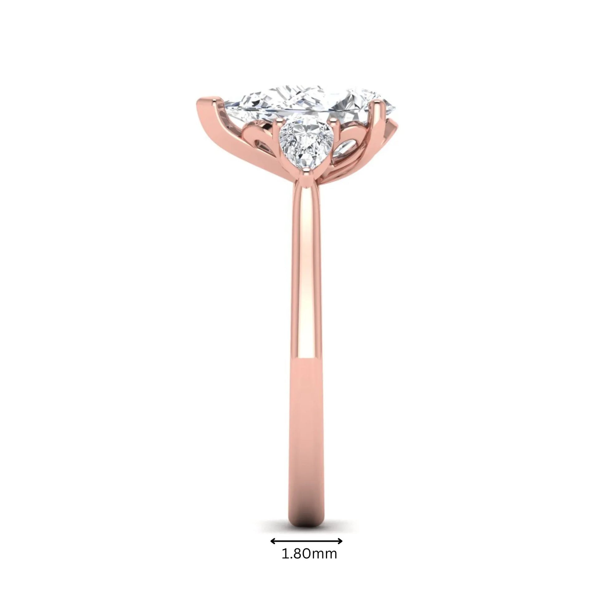 IGI certified pear cut lab grown diamond three stone engagement ring with pear side diamonds in rose gold.