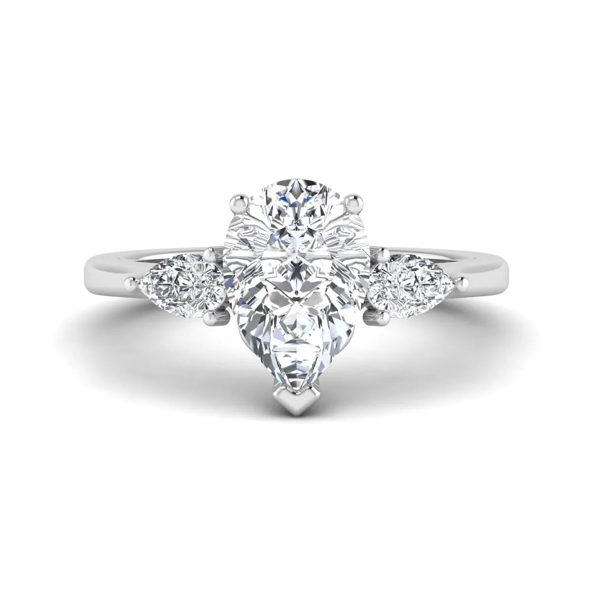 IGI certified pear cut lab grown diamond three stone engagement ring with pear side diamonds in white gold.